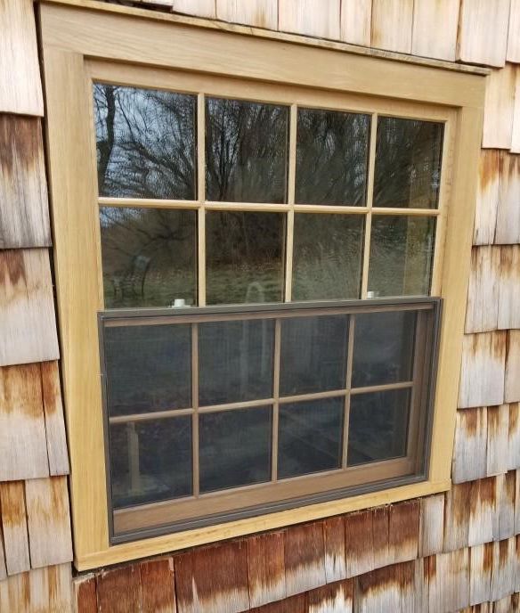 wooden framed window clapboard house